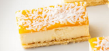 Little Secrets Bakehouse Gluten Free Mango Coconut Cheesecake Slice